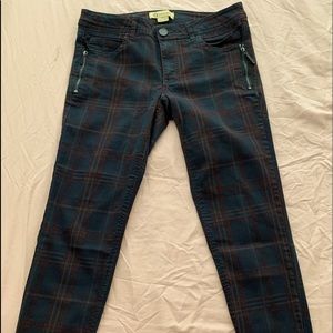 Dark blue and red plaid Democracy Jeans with side zippers.